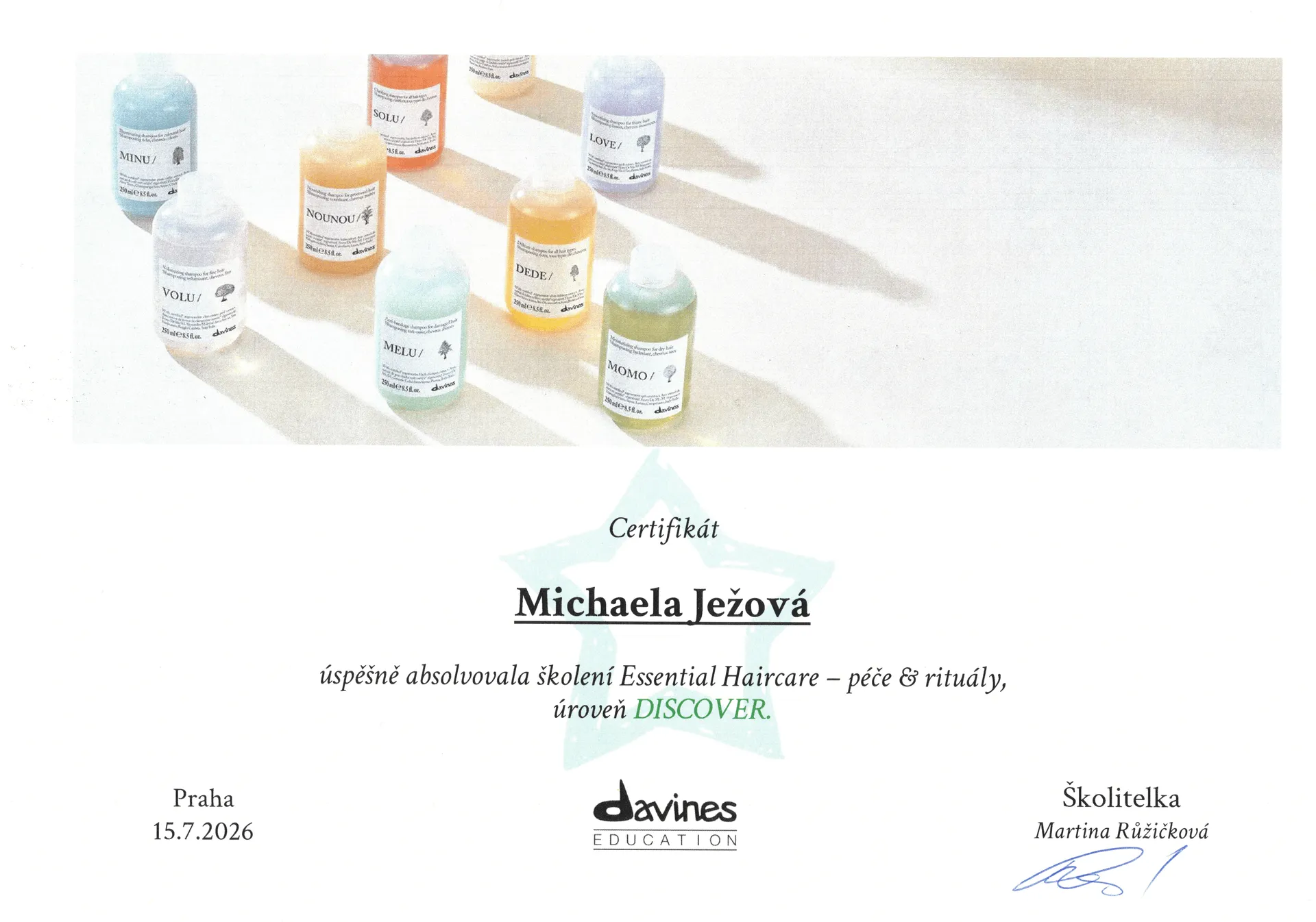 Sken certifikátu Davines Education pro Michaelu Ježovou - školení Essential Haircare - péče & rituály, úroveň Discover, Praha 15. 7. 2026